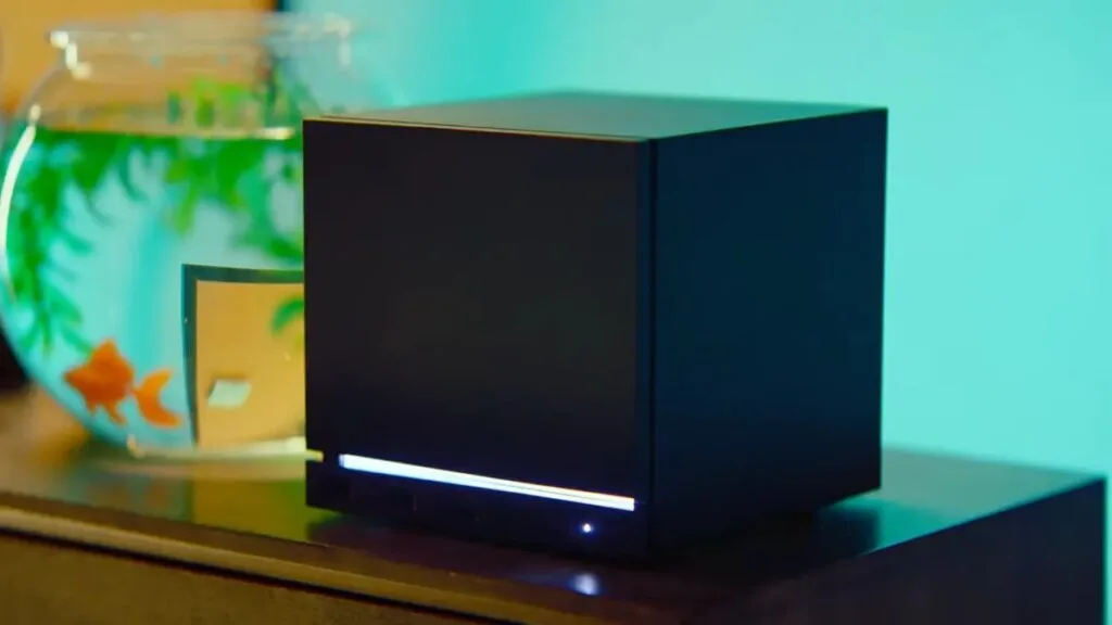 Steam Machine 2026 da Valve sobre mesa de sala de estar